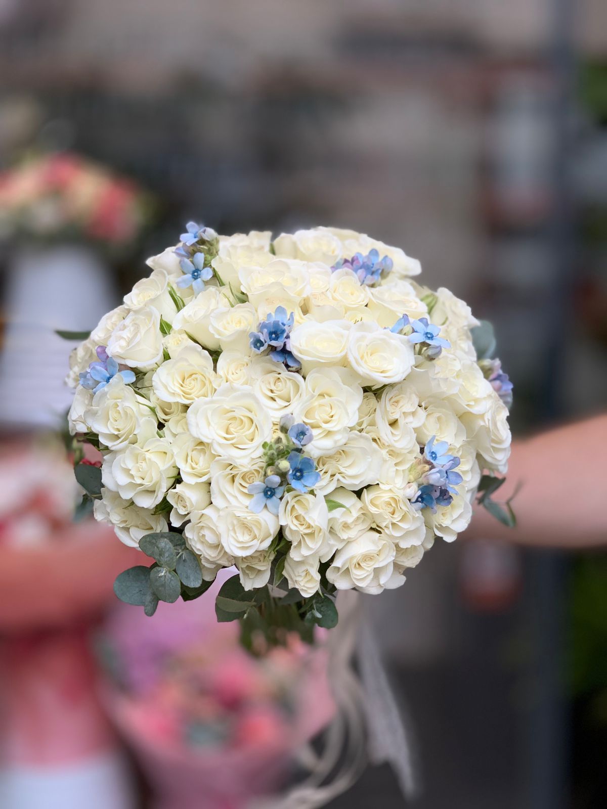 White Bridal Bouquet with Blue Flowers